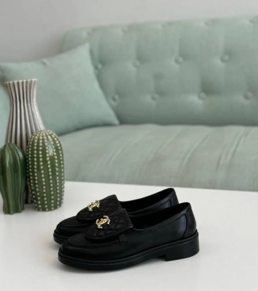 Chanel Black Leather Loafers – Gold-Tone Round Lock